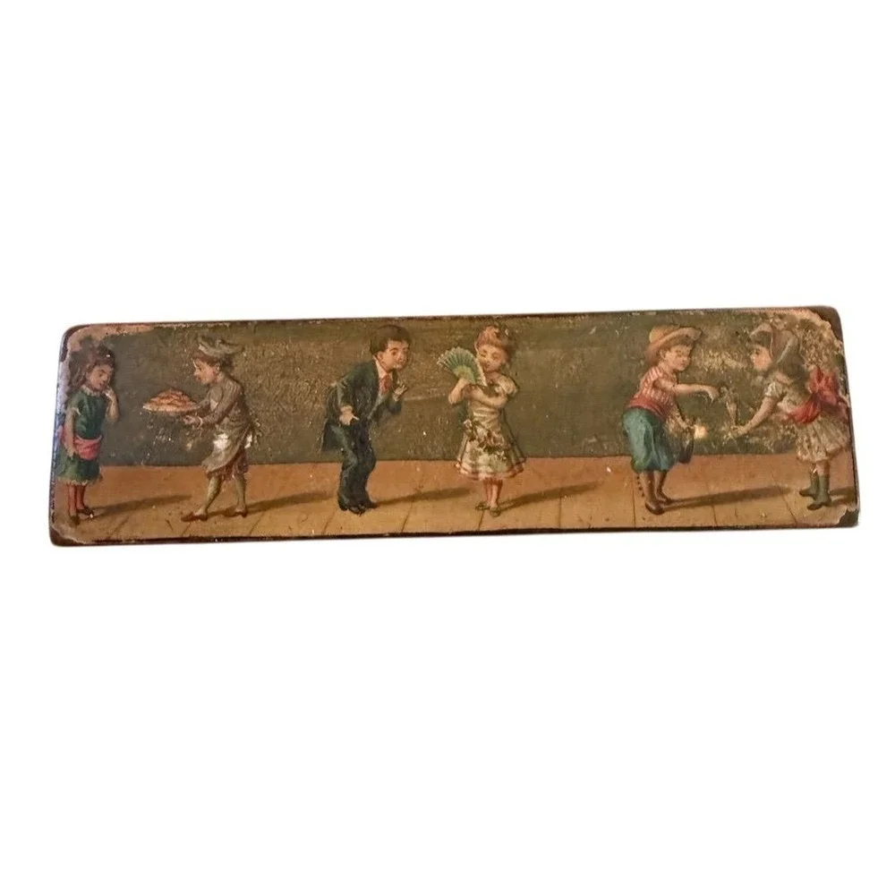 Antique pencil‎ box pre 1800's featuring children on the front and a cross